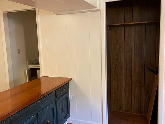 Kitchen bar and food prep area. Closet for food storage