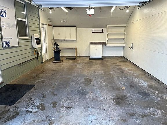 Attached 1 1/2 stall garage