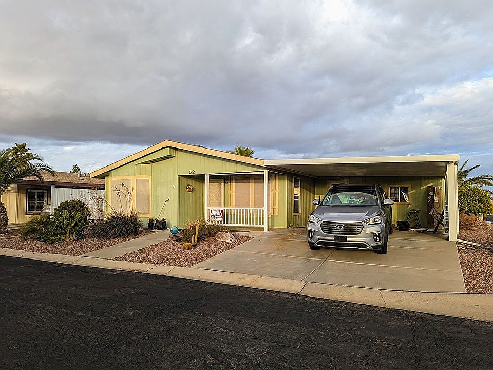 Front porch & 2 car carport 