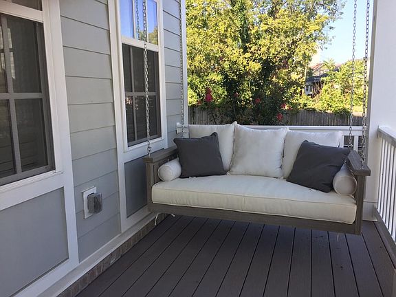 Swing on front porch first level deck