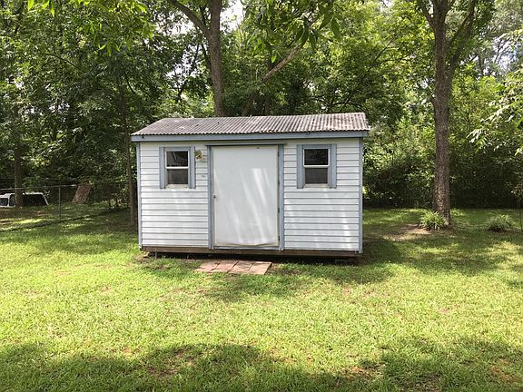 Storage building.  Back yard fenced