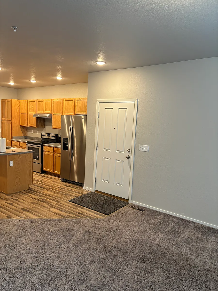 Open, bright floor plan to a beautiful kitchen and open living/dining room. New paint and carpets are like new! - 2940 Kincaid Dr #106