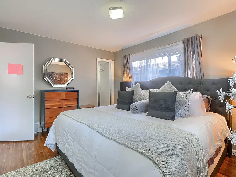 Master Bedroom on Main floor with adjoining half bath