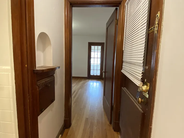 hallway into the bedroom with key nook.
