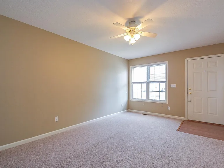 Actual living room has vinyl flooring and paint may not be the same shade as depicted in the picture.