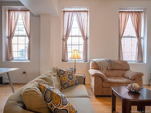 Flank of windows letting in loads of sunlight