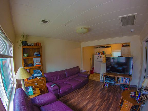 Another living room into kitchen