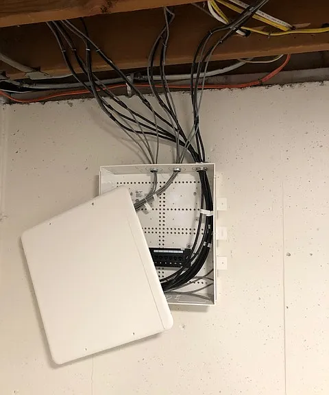 Cat 5 Ethernet cable hard wired throughout the house if needed
