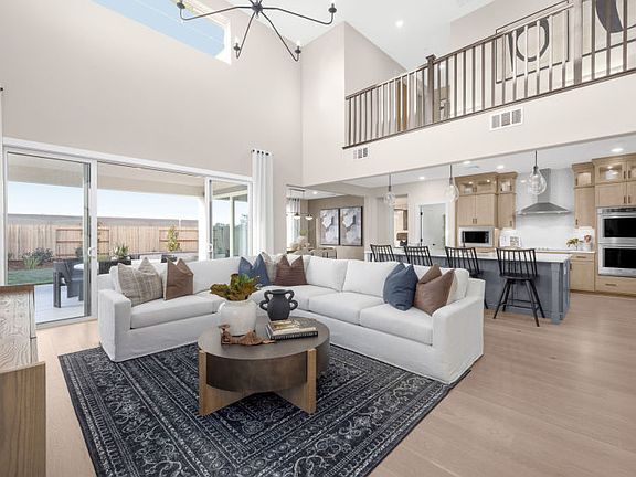 Open main living area with double height ceilings