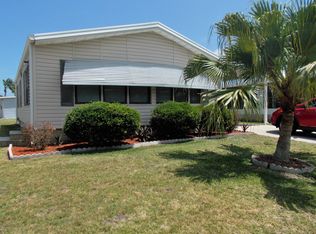 921 Oleander Cir, Barefoot Bay, FL 32976