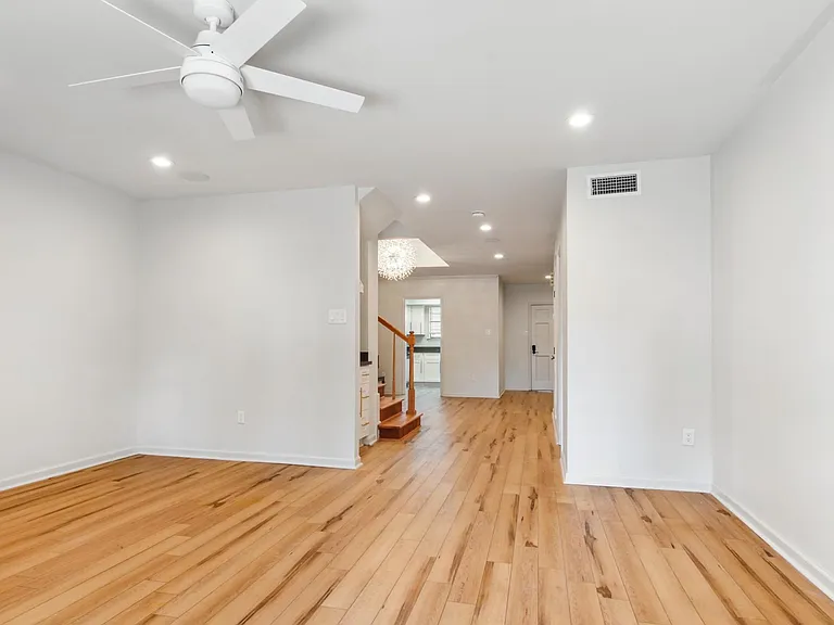 View from Den looking toward Dining Room and Kitchen.
