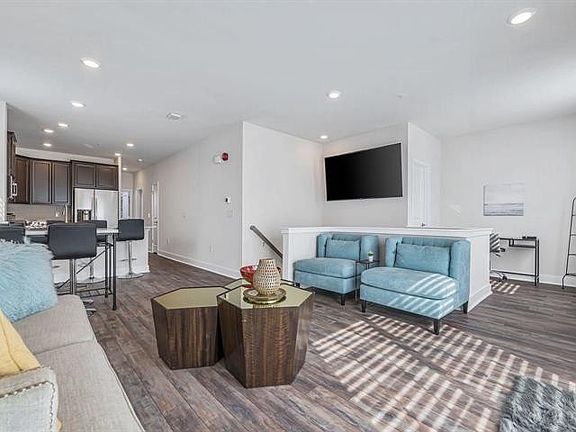 Main Living Space **Photos include staging to highlight the space and layout. This rental is offered unfurnished**