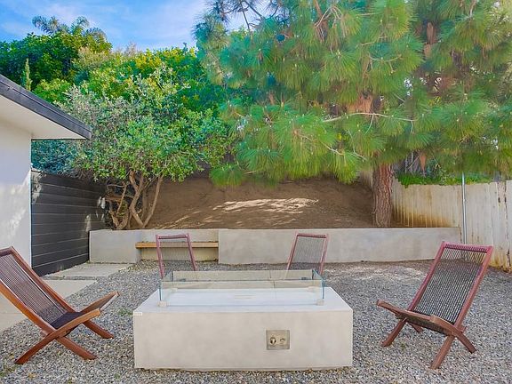 Back courtyard with fire pit.
