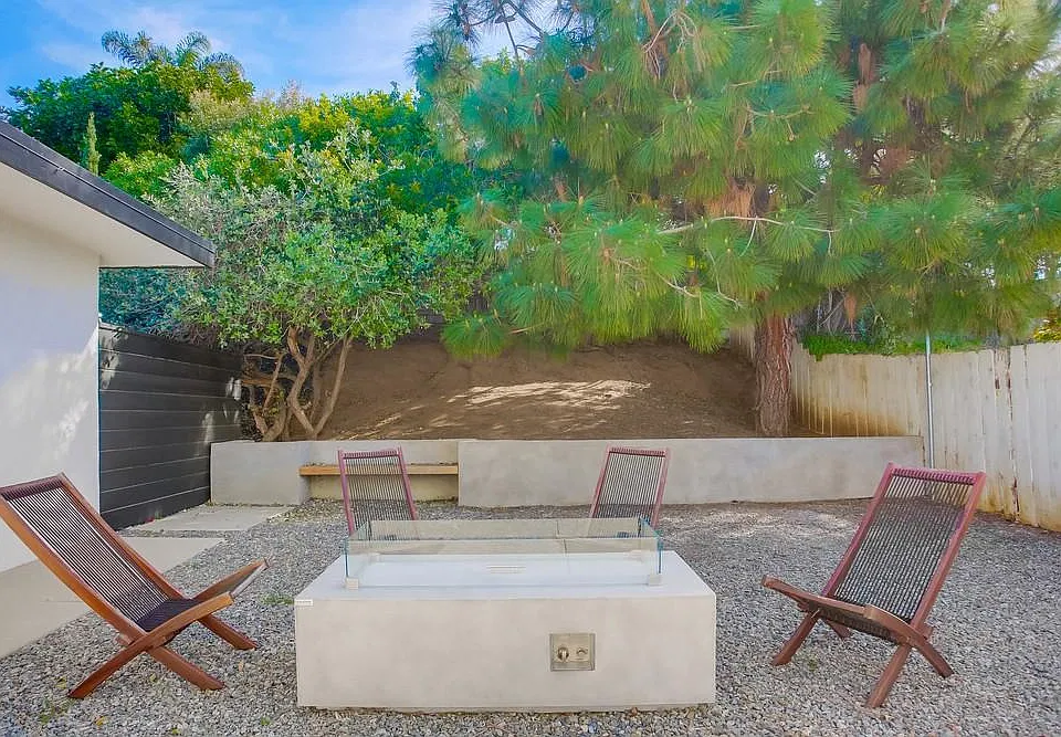 Back courtyard with fire pit.