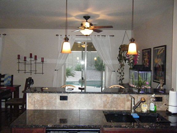 view of pool from kitchen