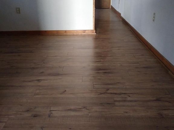 Newly installed wood flooring in bedroom 1 & 2