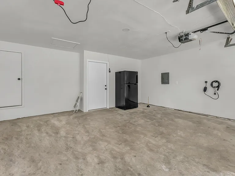 Full size refigerator and freezer in the garage for your use. Ev Charger