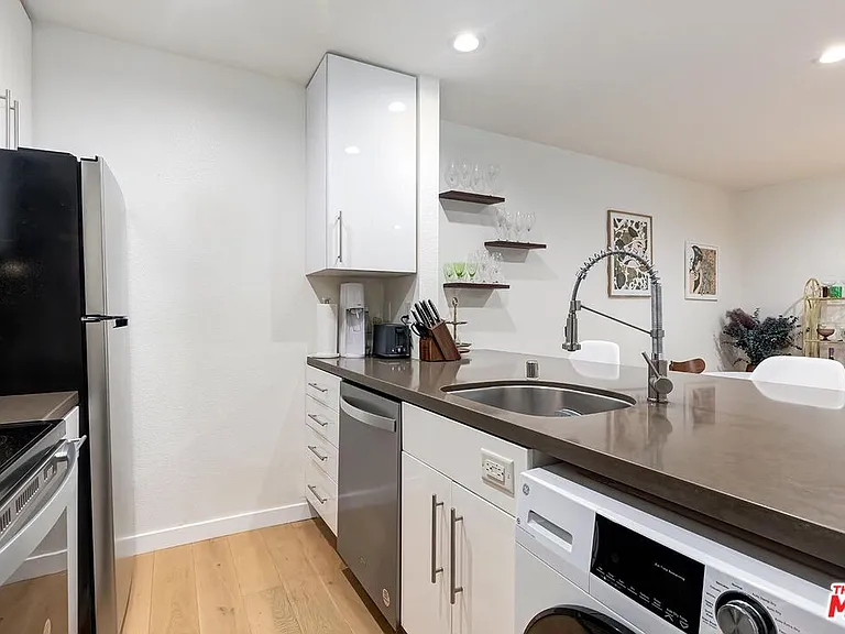 141 S Clark Dr #208 — Photo 21