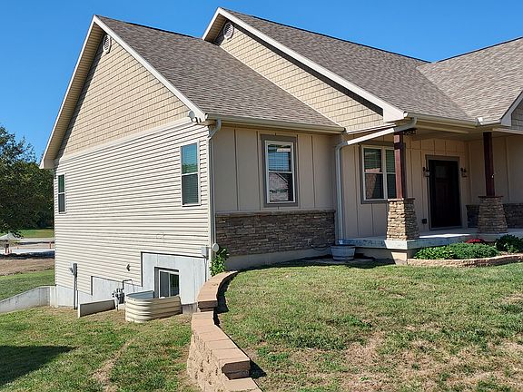 Front and side yard of house