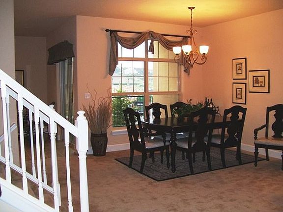 Dining area looks out onto patio