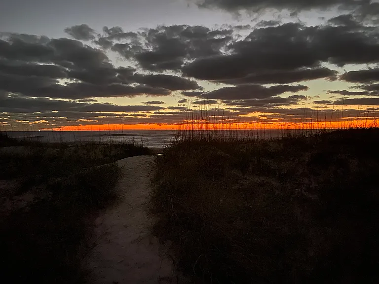 Early risers catch the beauty of a sunrise every day just a block away.