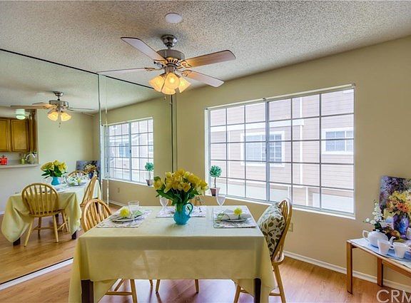 Entertaining while cooking in the kitchen is easy as the kitchen opens up to the bright and airy dining area.