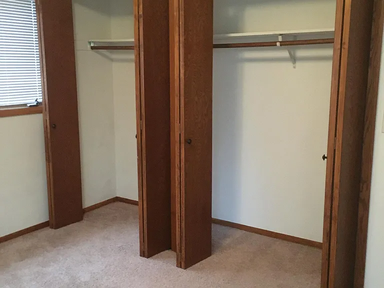 Closets in smaller bedroom