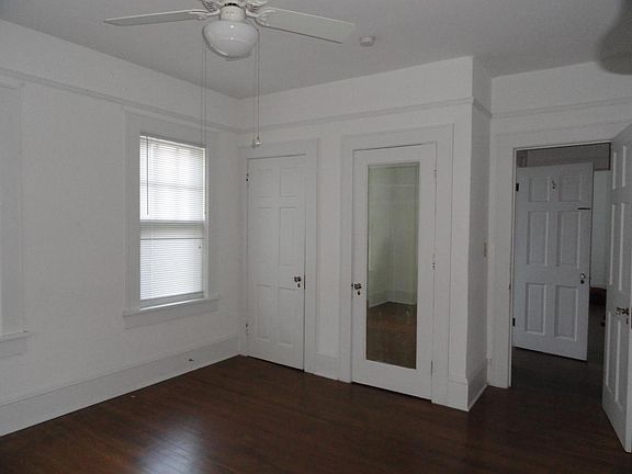 Master bedroom with his and her closets.