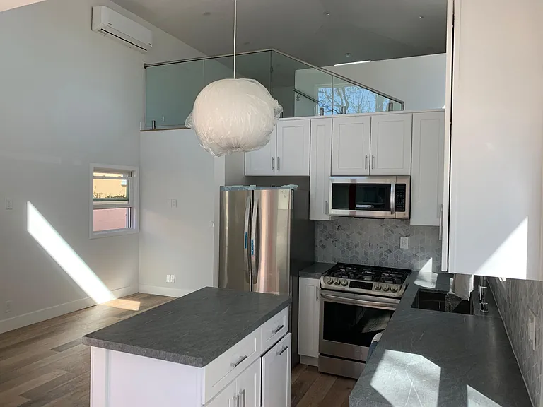 Bright, airy and open, with high ceilings and ample storage and counter space.