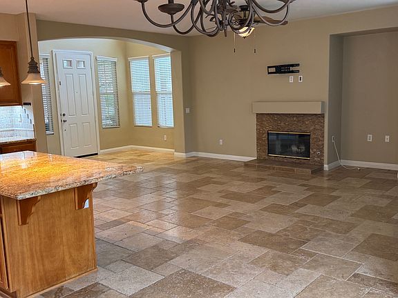 Entry way from the front door into the heart of this home. Notice the flat screen TV wall mount that has been installed for your convenience.