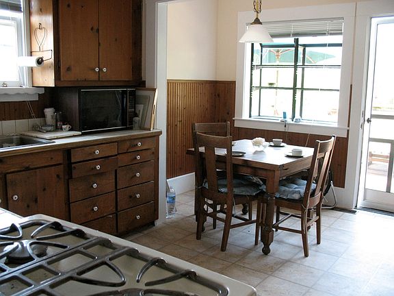 Kitchen with Garden window and door to deck.
