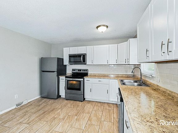 3rd image of 19304 E 5th Terrace Ct N