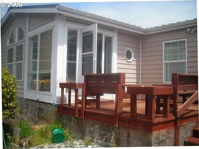 Wood Deck Leads to Enclosed Entry