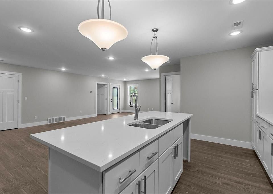 Kitchen is open to living room and dining area.