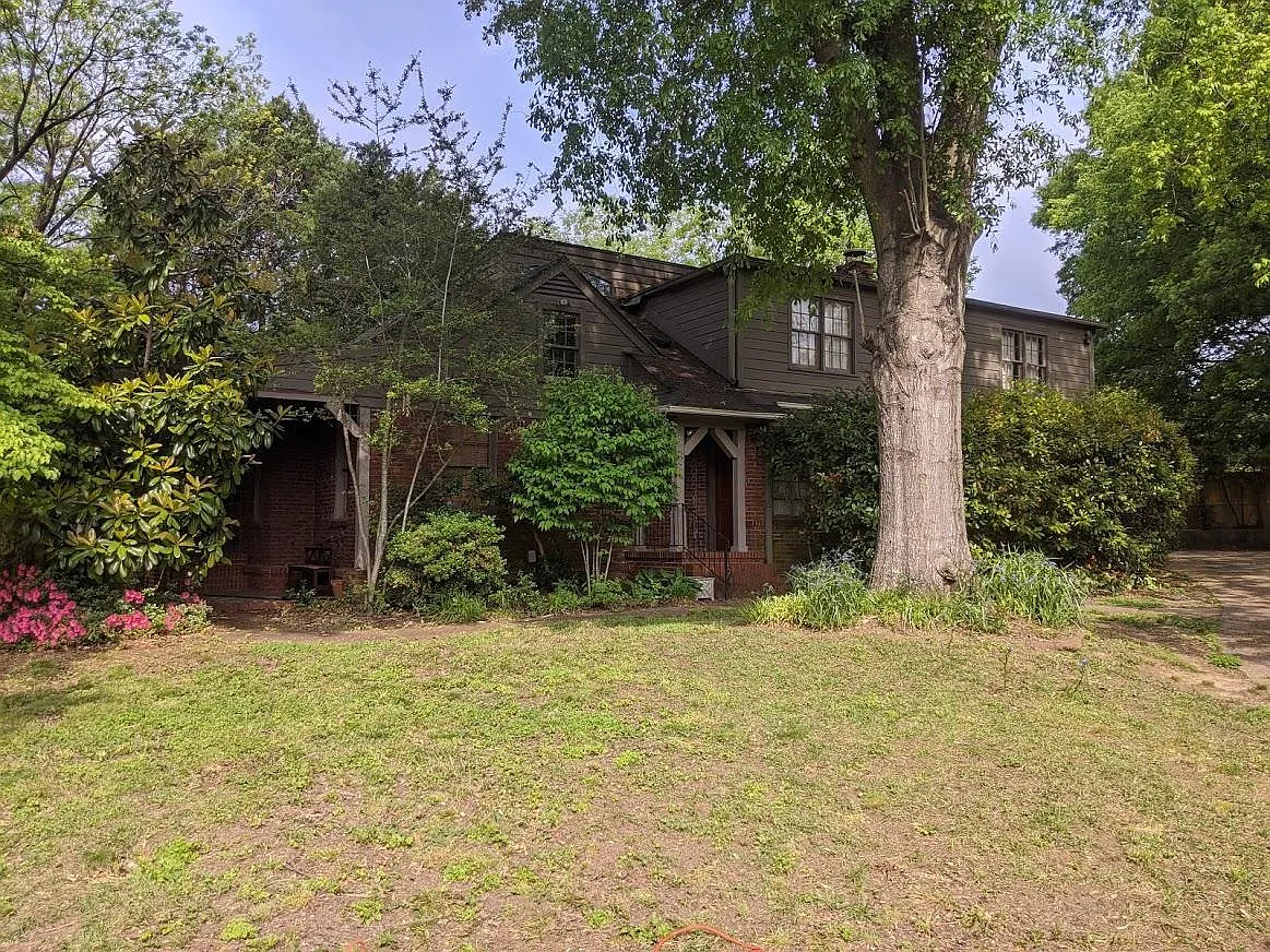 Two Story House showing Side Entrance, next to Parking Area large enough for four cars. - 3810 Kenwood Ave #HOUSE