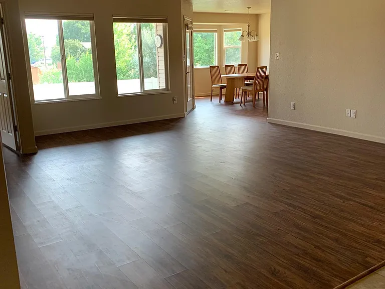 Ceramic Tile Entry and Wood Plank Laminate Floors throughout great room and the rest of the home.