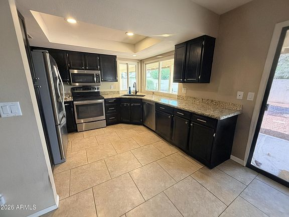 5th image of 9648 W ROSEMONTE Drive