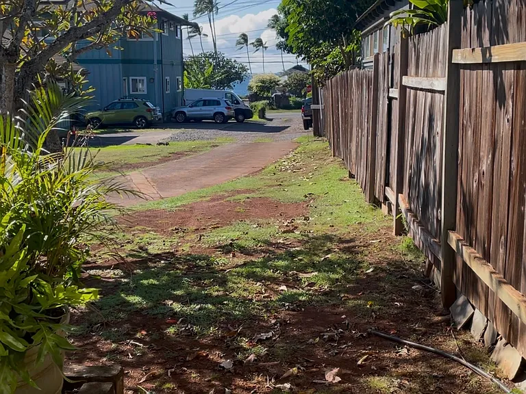 Standing on the side of the Cottage facing the driveway out to street