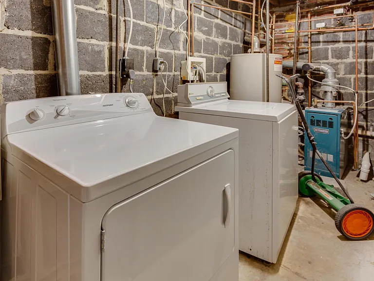 Utility room with washer and dryer