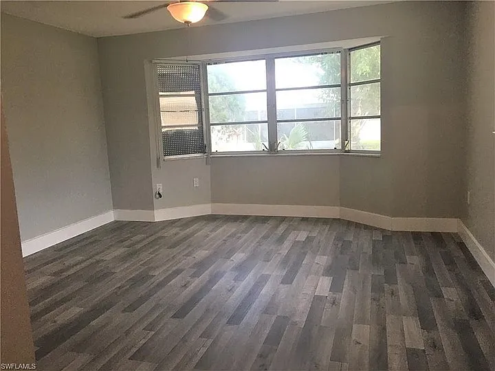 Large master bedroom with bay windows