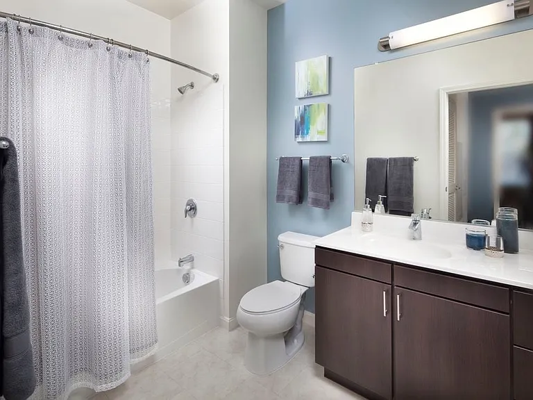 Classic Package bath with white laminate countertops and espresso cabinetry