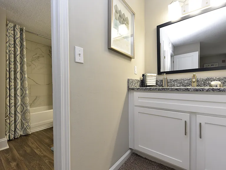 Experience luxury living with this elegantly designed modern bathroom.