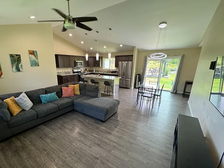 Welcome to this comfortable home with open concept kitchen, living and dining areas.