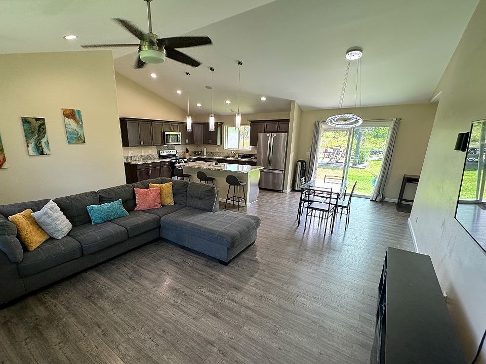Welcome to this comfortable home with open concept kitchen, living and dining areas.