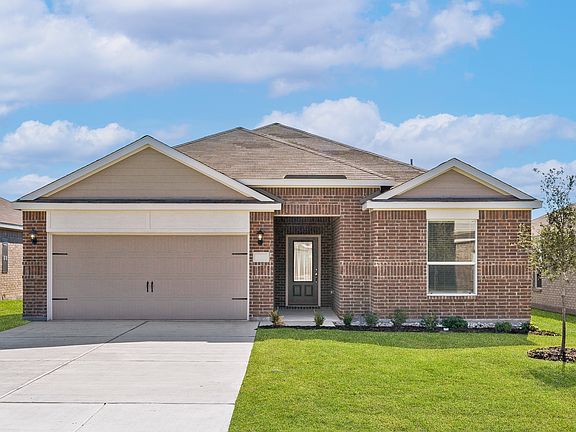 The Reed is a beautiful one-story floor plan with a brick exterior.