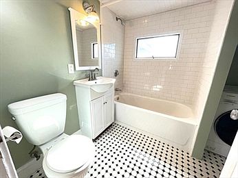 Bathroom with laundry
