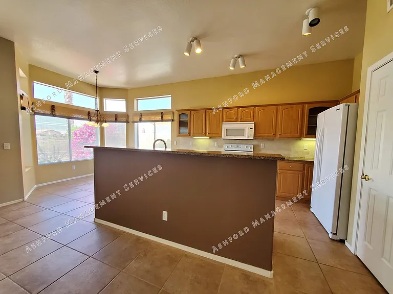11558 W Tortoise Ct — Photo 9