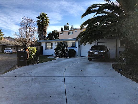 one car garage with long driveway