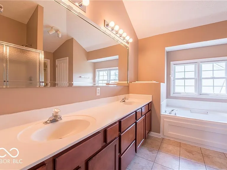 Master bathroom has bathtub and shower separatly and has closet too.