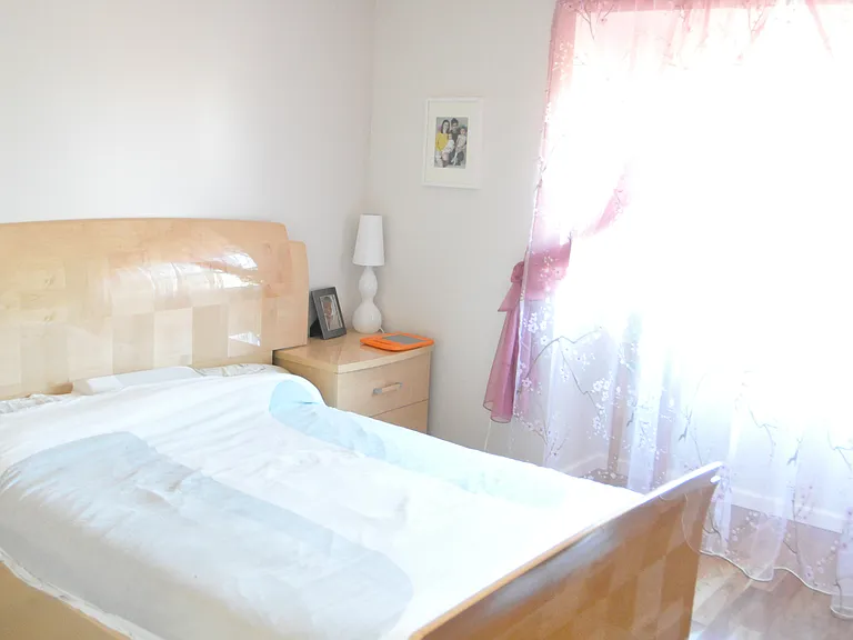 master bedroom with a bed